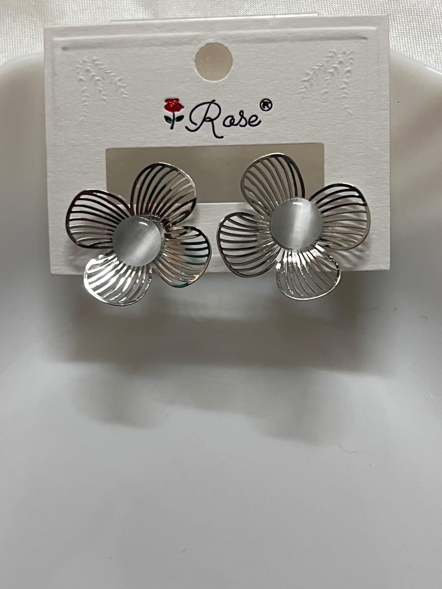 White floral earrings