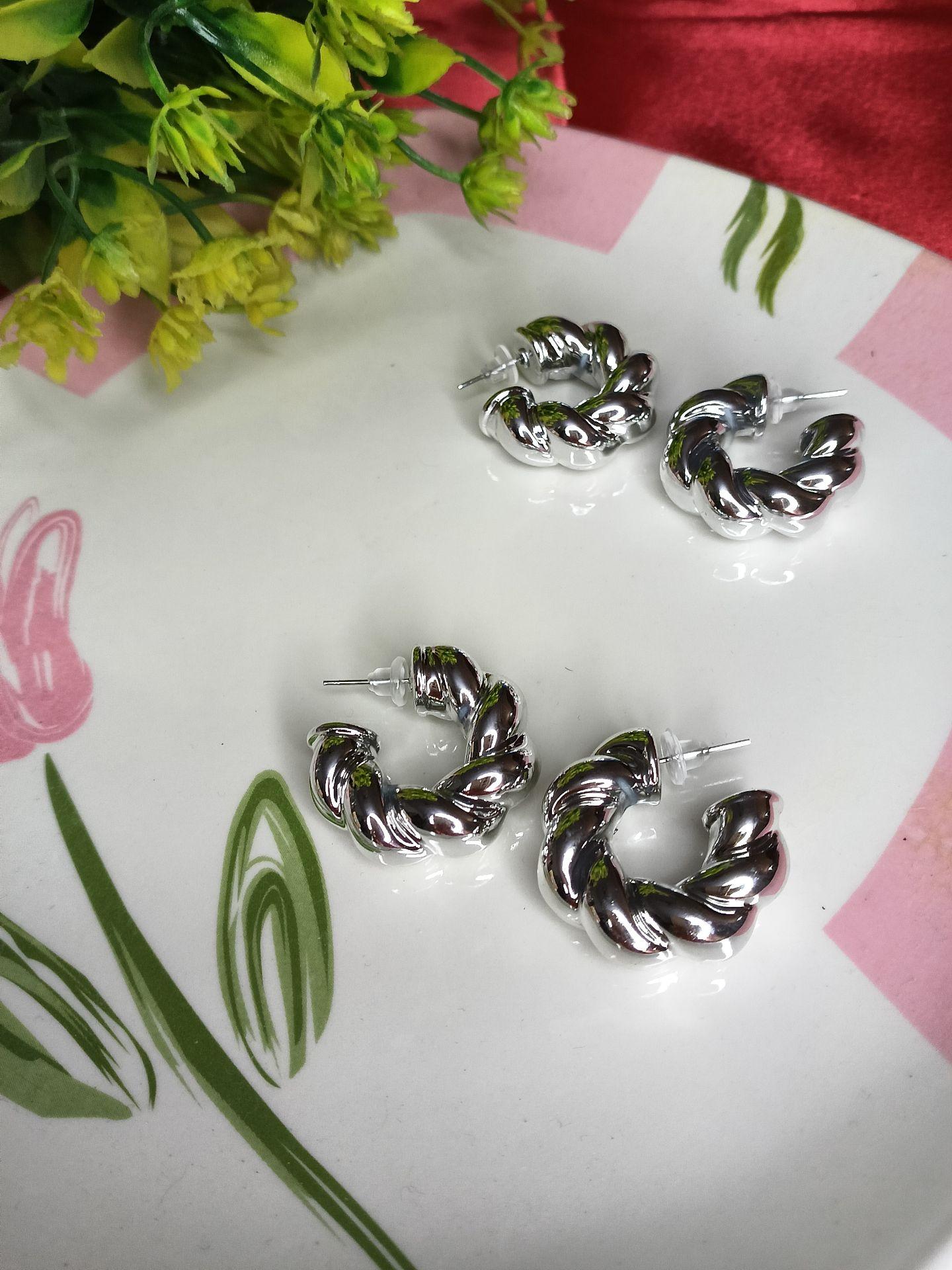 Silver metallic twist earrings