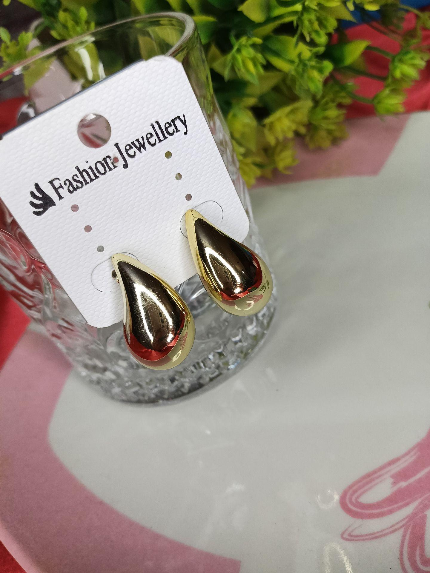Golden metallic drop earrings