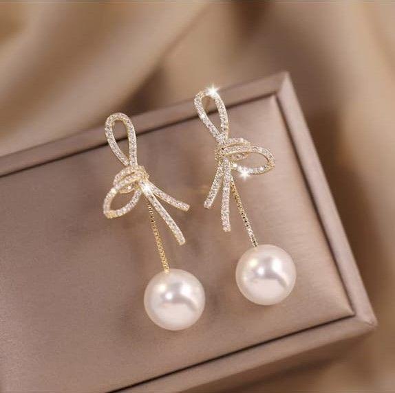 Pearl Bow – Elegant Drop Earrings