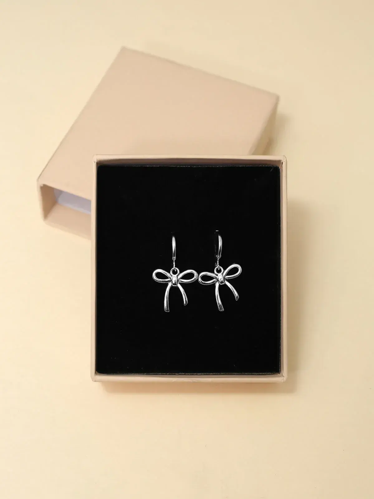 Silver Bow Drop Earrings